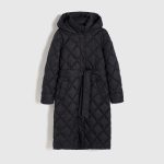 Quilted coat with tie waist belt